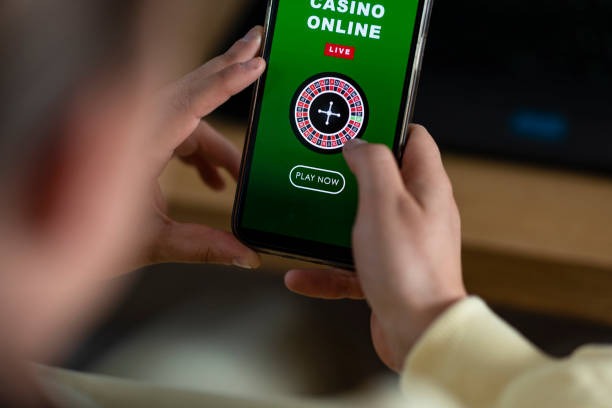 Live casino dealer at blackjack table with multi-camera setup